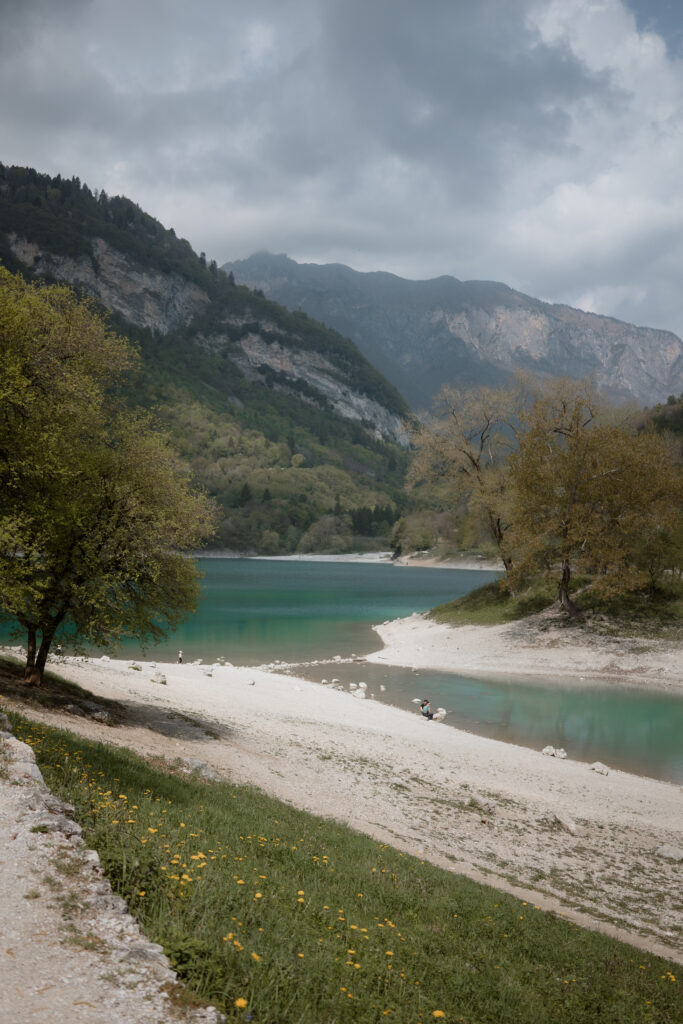 Turquoise Lake Tenno surrounded by mountains during an Italy elopement day