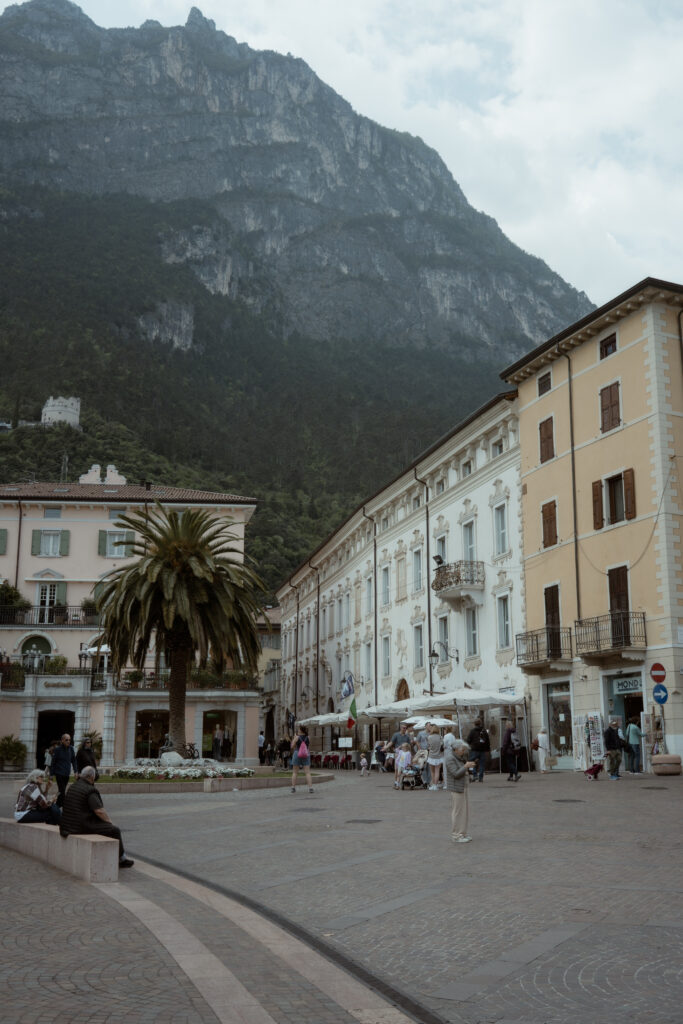 Riva del Garda town centre with mountains during a Lake Garda elopement day