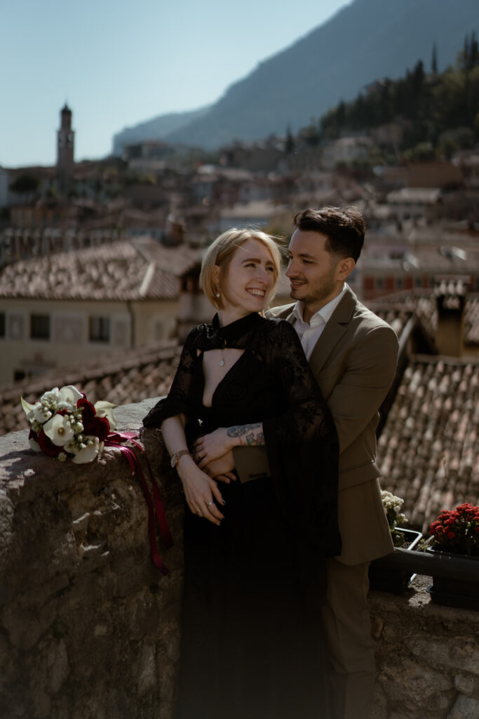 Couple on a terrace in Limone del Garda during their Lake Garda elopement