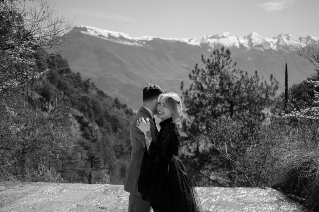 Black and white portrait of a couple embracing during their Limone del Garda elopement