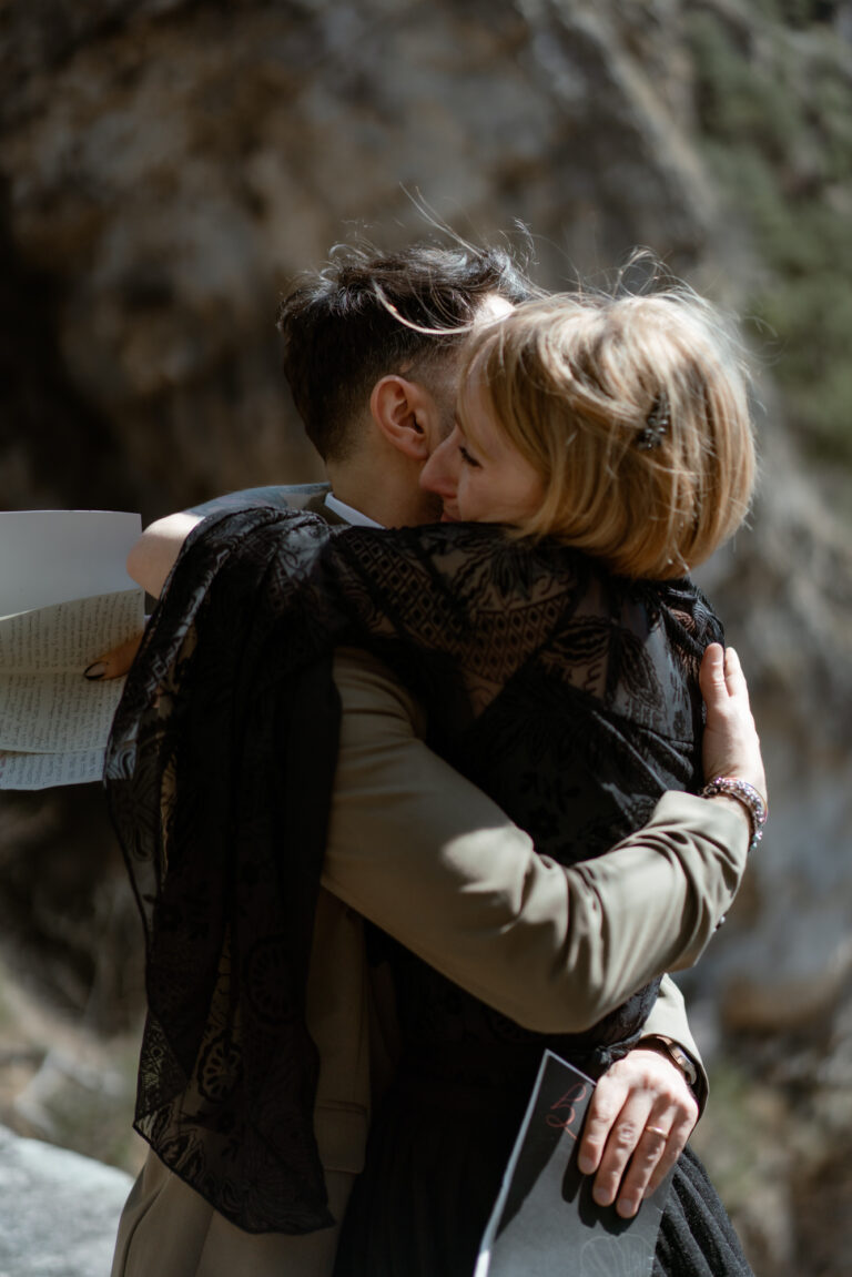 Couple hugging after their vows during a Limone del Garda elopement in Italy
