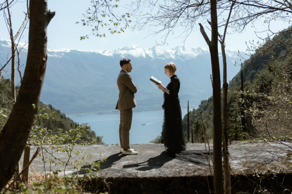 Couple having an intimate elopement ceremony above Lake Garda in Limone del Garda