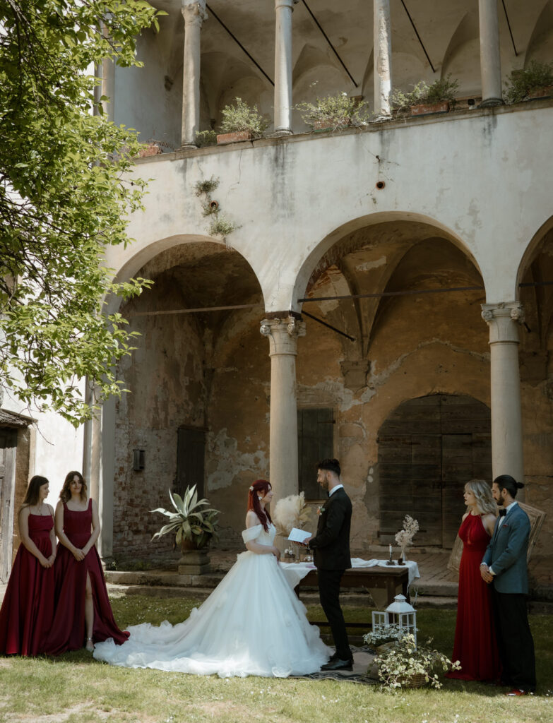 Intimate wedding ceremony at a countryside villa in Italy with close guests