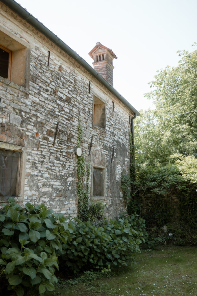 Stone countryside villa exterior used as an intimate wedding venue in Italy
