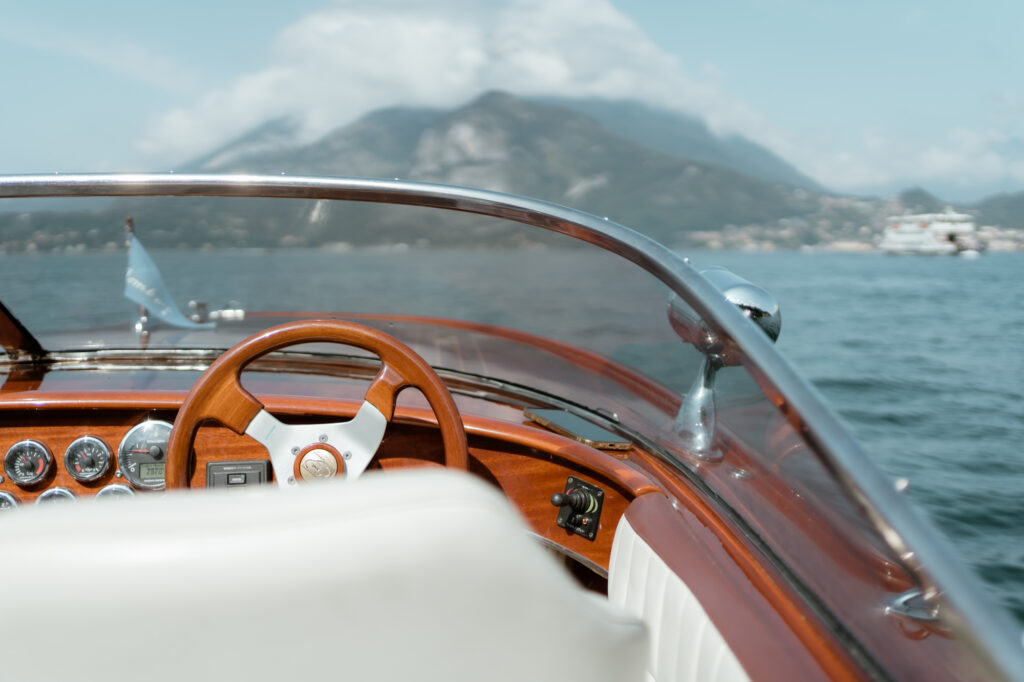 Wooden boat detail on Lake Como near Varenna during an Italy elopement day