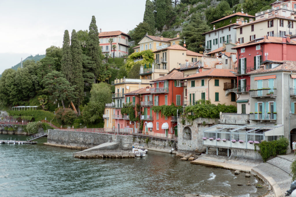 Colourful waterfront houses in Varenna during a couple session on Lake Como in Italy
