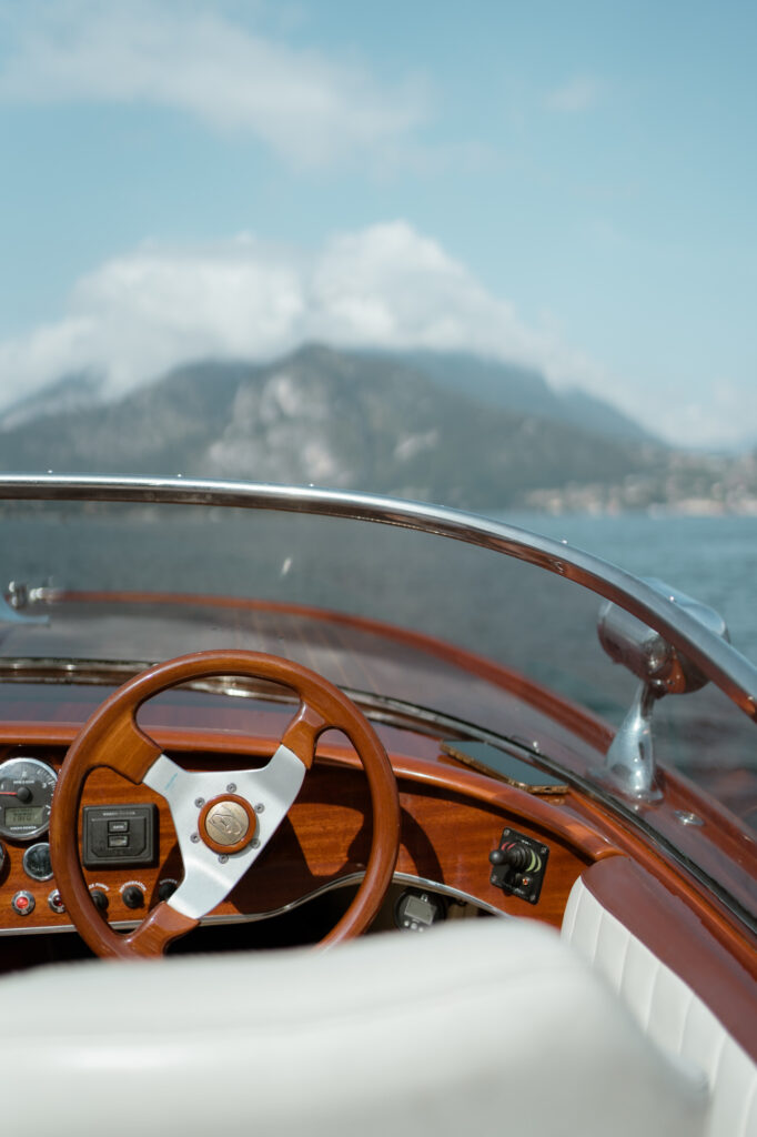 Classic wooden boat detail on Lake Como near Varenna during an Italy elopement session